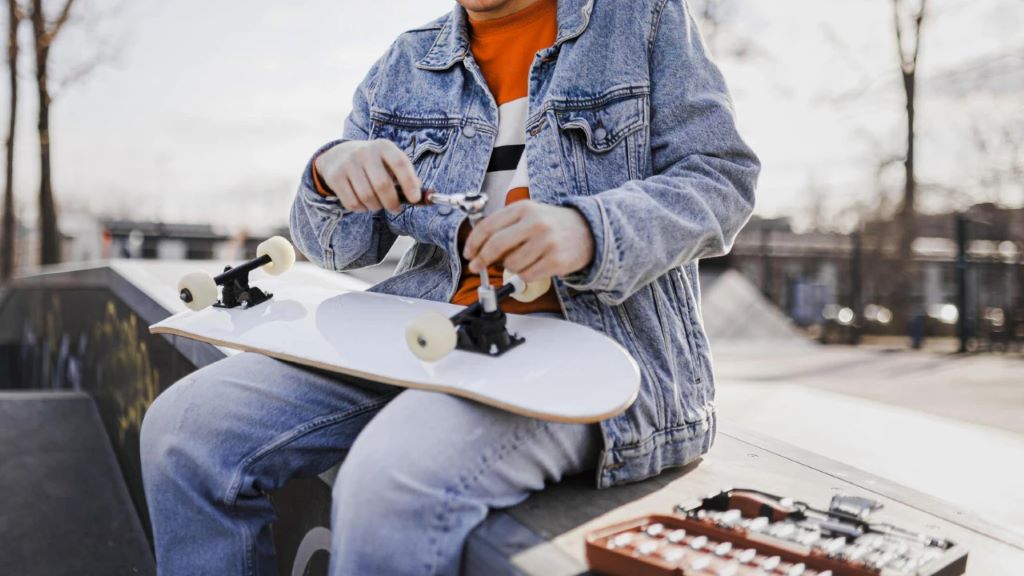 What is the correct way to put trucks on a skateboard