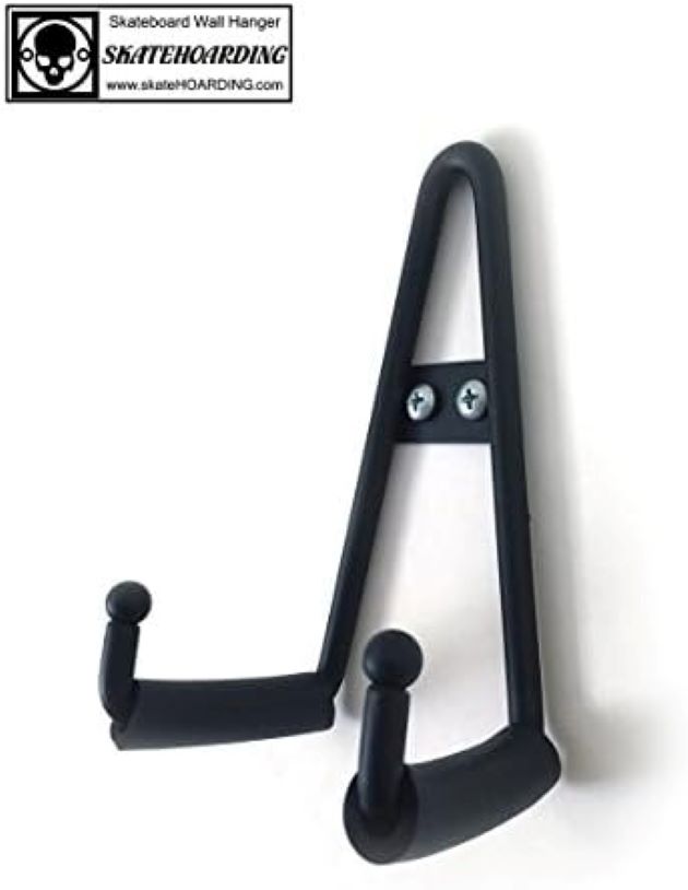 Sleek SkateHoarding wall hanger storing multiple skateboards and longboards.