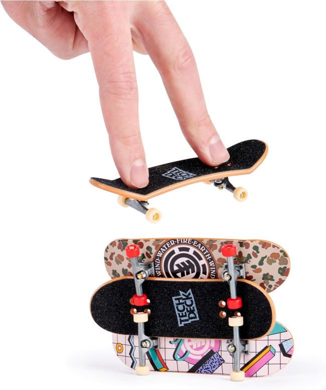 Set of 4 Tech Deck Ultra DLX mini skateboards, customizable and perfect for kids 6 and up.