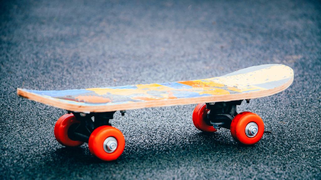 Skateboard wheels in different sizes and hardness levels displayed for speed and control comparison